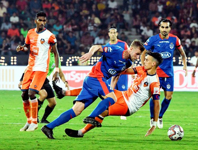 Bengaluru FC and Goa FC players vie for the ball during the ISL 2019 Final in Mumbai, on Sunday