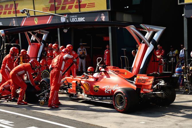Germany's Sebastian Vettel driving the (5) Scuderia Ferrari SF90 makes a pit stop during the Australian F1 Grand Prix at Albert Park circuit in Melbourne on Sunday