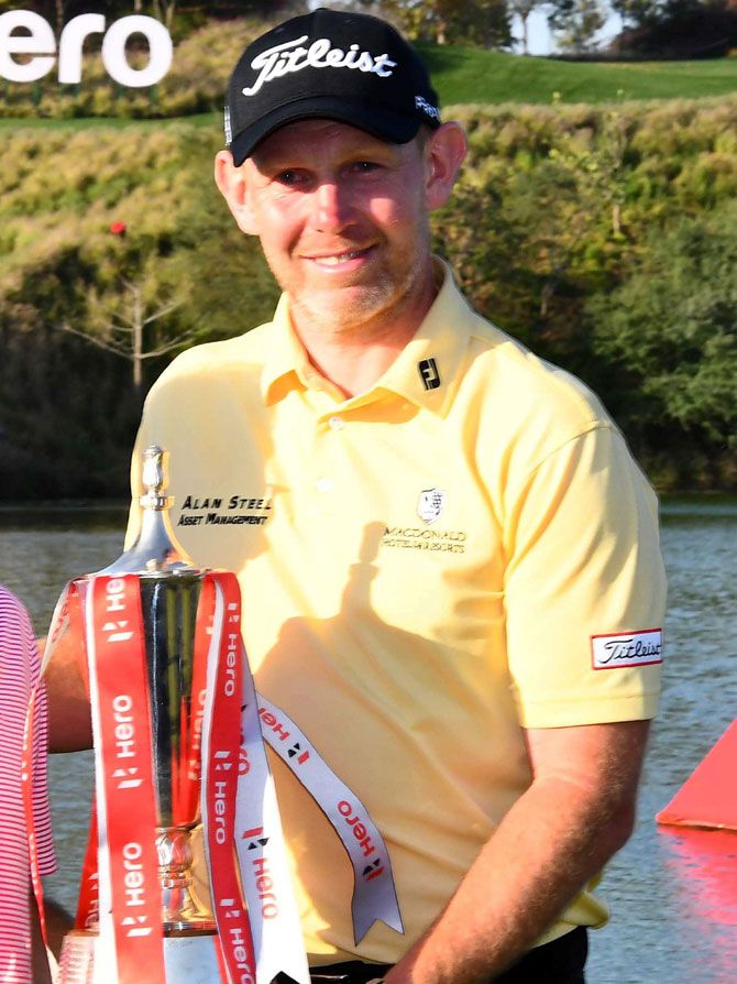 Hero Indian Open champion Stephen Gallacher poses with the trophy in Gurugram on Sunday