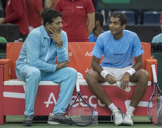 India's captain Mahesh Bhupathi, left, with Ramkumar Ramanathan during a Davis Cup match.
