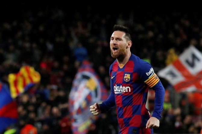 Lionel Messi celebrates scoring Barcelona's second goal in Saturday's La Liga match against Celta Vigo