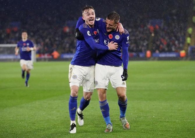 James Maddison celebrates scoring Leicester City's second goal with Jamie Vardy during Saturday's Premier League match against Arsenal