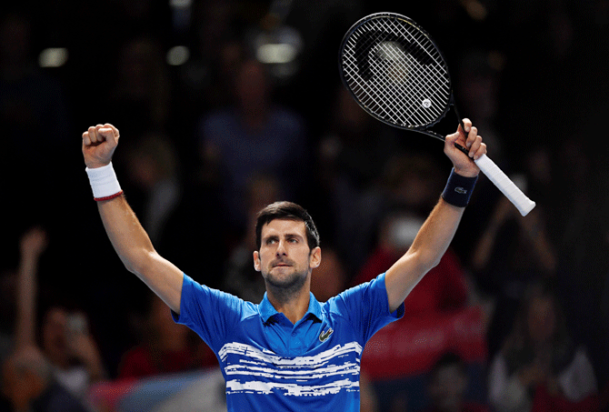 Serbia's Novak Djokovic celebrates after defeating Italy's Matteo Berrettini