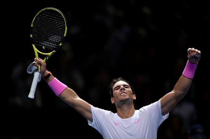Spain's Rafael Nadal celebrates winning his group stage match against Russia's Daniil Medvedev 