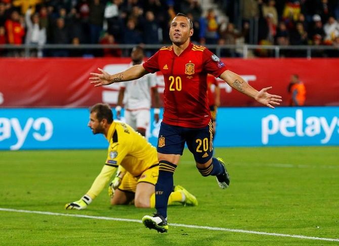 Santi Cazorla celebrates scoring Spain's second goal 