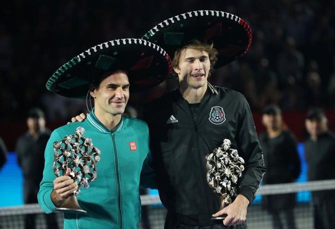 Switzerland's Roger Federer and Germany's Alexander Zverev pose for a photo after the match