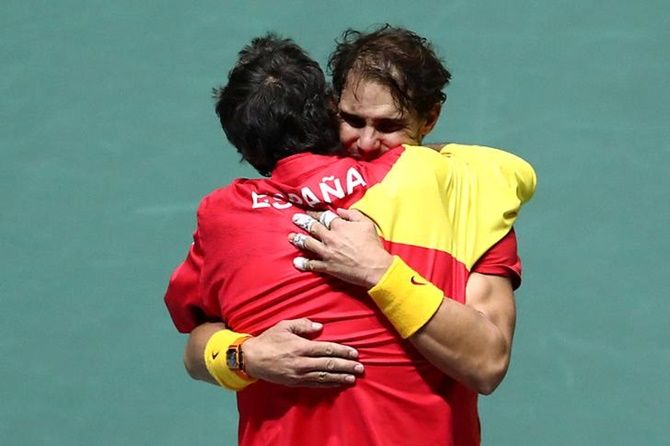 Spain captain Sergi Bruguera celebrates with Rafael Nadal