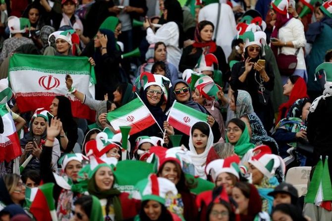 Iranian women fans attend Iran’s FIFA World Cup Asian qualifier against Cambodia