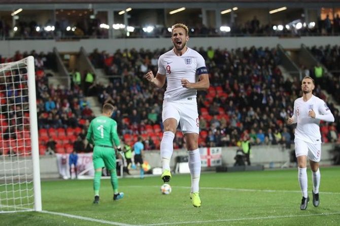 Harry Kane celebrates putting England ahead from the penalty spot.