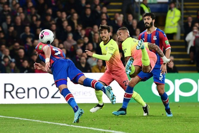 Manchester City's Gabriel Jesus scores his team's first goal against Crystal Palace at Selhurst Park in London