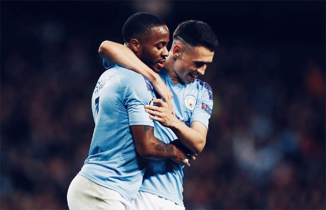 Raheem Sterling's link-up play with Sergio Aguero and Phil Foden (in picture with Sterling) was at times breath-taking, leading to former Manchester United defender Rio Ferdinand to suggest on BT Sport after the game he was now among the top five players in the world