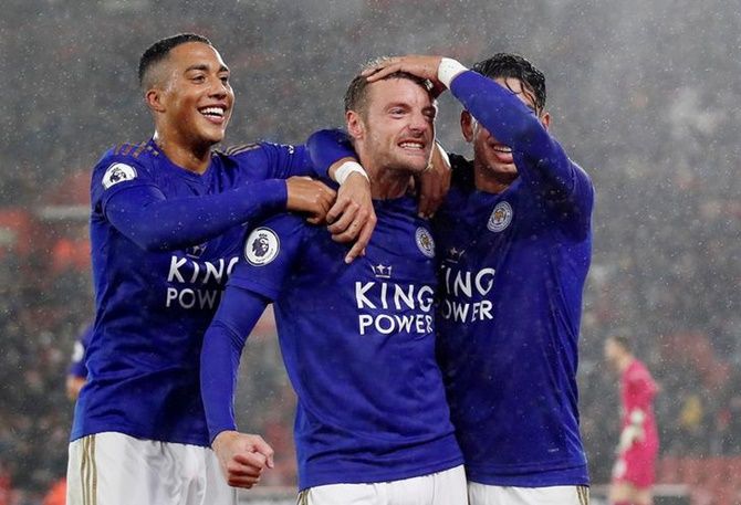 Jamie Vardy celebrates scoring Leicester City's fifth goal with Ayoze Perez and Youri Tielemans