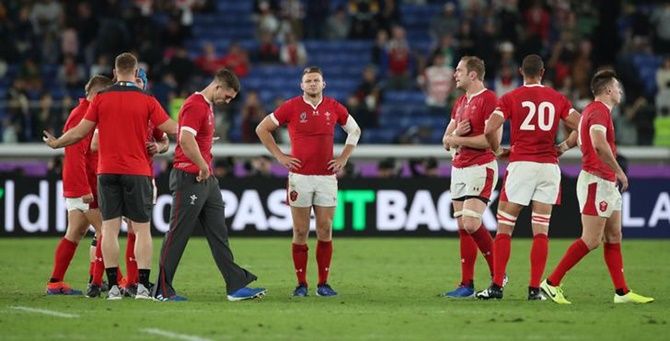 Wales players react after the defeat