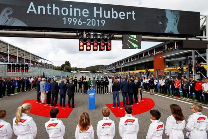 Formula One drivers, members of each team and staff observe a minute's silence ahead of the Belgiam Grand Prix in memory of Anthoine Hubert, who was killed in an accident during a Formula 2 race on Saturday. 