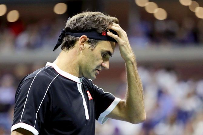 Roger Federer was beaten by Grigor Dimitrov in the US Open quarter-final at Flushing Meadows in New York on Tuesday