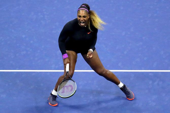 USA's Serena Williams celebrates a point during her quarter-final match against China's Qiang Wang 