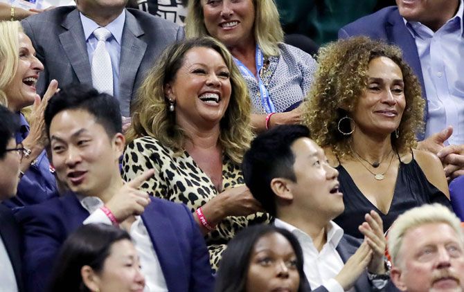 Singer and actor Vanessa Williams, centre, attends the the quarter-final between Serena Williams and Qiang Wang