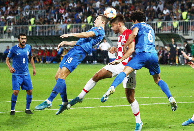Croatia's Bruno Petkovic in action with Azerbaijan's Anton Krivotsyuk and Bahlul Mustafazade during their Euro 2020 Qualifier Group E match at Bakcell Arena, Baku, Azerbaijan, on Monday