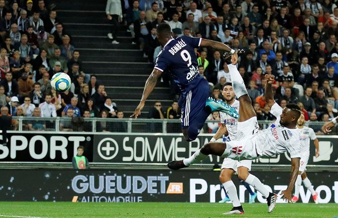 Olympique Lyonnais' Moussa Dembele scores their second goal against Amiens SC during their Ligue 1 match at Stade de la Licorne in Amiens, France, on Friday