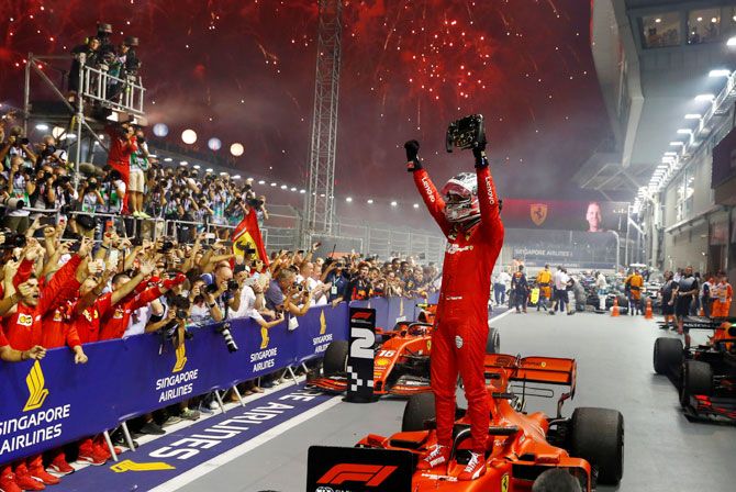 Ferrari's Sebastian Vettel celebrates after winning the Singapore F1 Grand Prix at Marina Bay Street Circuit, Singapore, on Sunday 