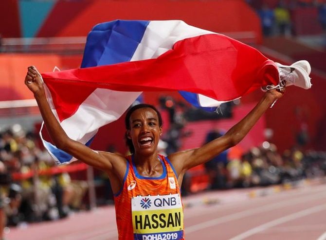 Sifan Hassan of the Netherlands celebrates winning the women's 10,000 metres gold.
