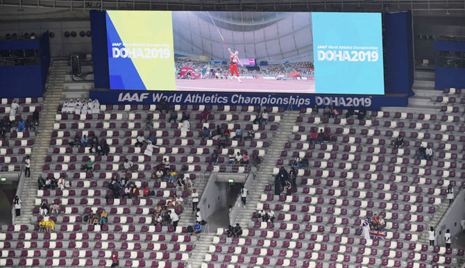 Empty seats are seen in the stands at Khalifa International Stadium on Day 4 of 17th IAAF World Athletics Championships in Doha, Qatar on Monday