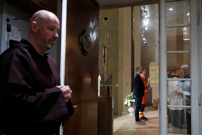 Triathlon champion Akos Vanek attends the Easter Saturday service after being baptized. 'Being a professional sportsman had required a special belief and commitment that was similar to a relationship with God,' he said.