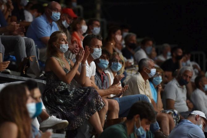 Masked up fans watch the Palermo Open final from the stands