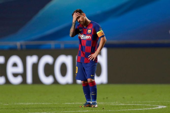 Lionel Messi wears a dejected look