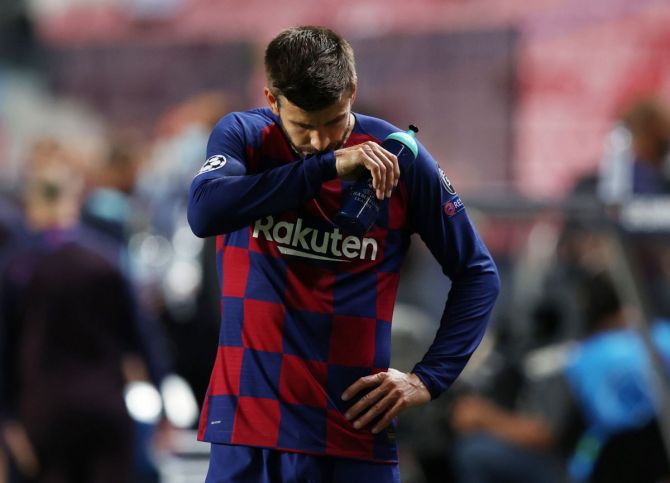 Barcelona's Gerard Pique looks dejected after the match 