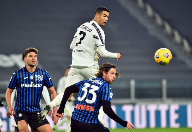 Juventus' Cristiano Ronaldo and Atalanta's Berat Djimsiti vie during their Serie A match at Allianz Stadium, Turin, Italy, on Thursday 