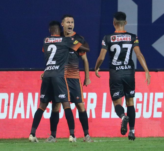 FC Goa's Igor Angulo celebrates with teammates on netting the injury time winner against Hyderabad FC at Vasco on Wednesday.
