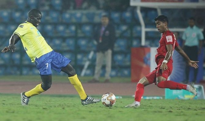 Kerala Blaster's Mouhamadou Gning tries to make his way past the NorthEast United defence