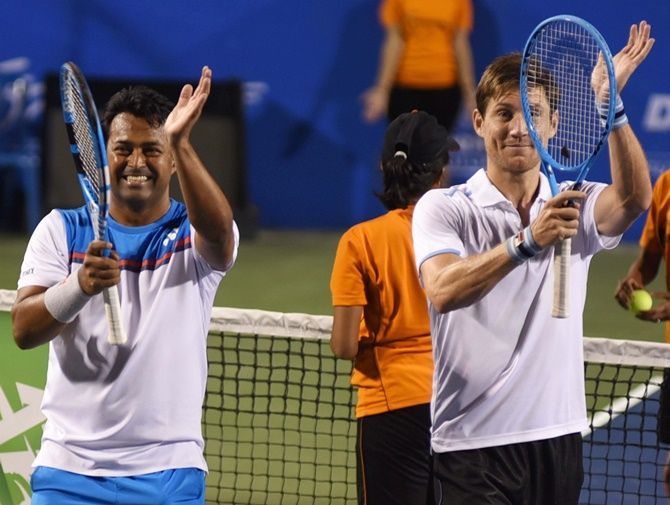 Leander Paes and Matthew Ebden celebrate victory over Jonathan Erlich and Andrei Vasilevski in the doubles semi-final at the Bengaluru Open on Friday.