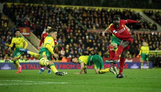 Sadio Mane essays from the top of the box to score for Liverpool in their Premier League match against Norwich City on Saturday.
