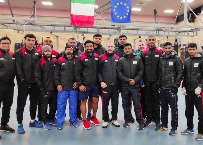 India's boxing team pose for a picture ahead of a training session in Assisi.