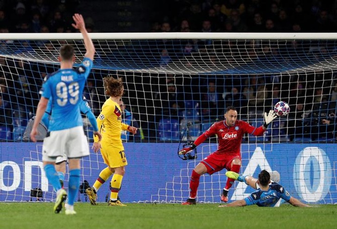 Antoine Griezmann scores the equaliser for Barcelona against Napoli