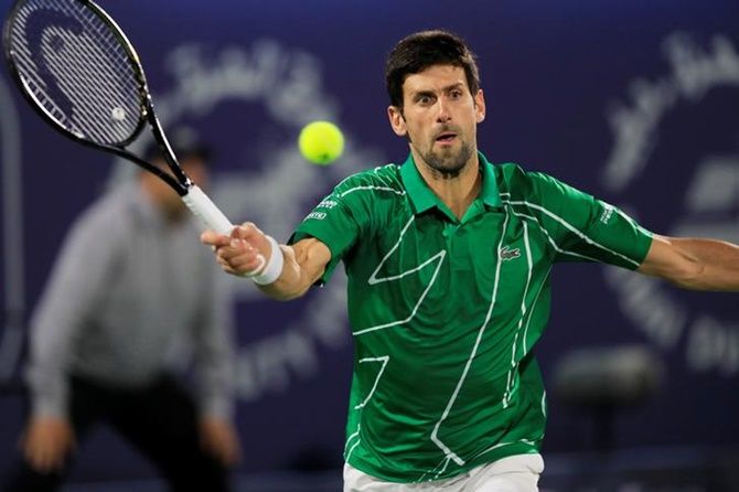Serbia's Novak Djokovic in action during his quarter final match against Russia's Karen Khachanov at the Dubai Open. 