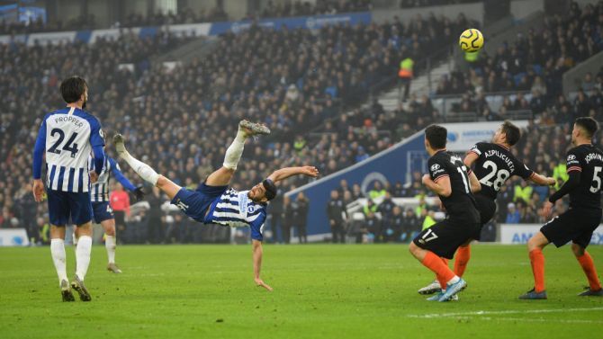 Brighton & Hove Albion's Alireza Jahanbakhsh scores with a spectacular overhead kick against Chelsea FC at American Express Community Stadium in Brighton
