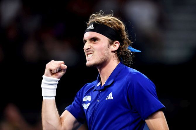 Greece's Stefanos Tsitsipas celebrates after defeating Germany's Alexander Zverev on day three of the 2020 ATP Cup Group Stage at Pat Rafter Arena in Brisbane on Sunday