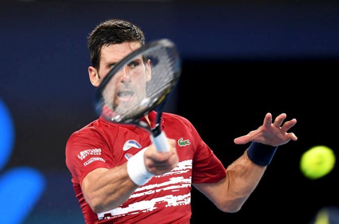 Serbia's Novak Djokovic plays a forehand return during his win over France's Gael Monfils on day four of the 2020 ATP Cup Group Stage match at Pat Rafter Arena in Brisbane on Monday