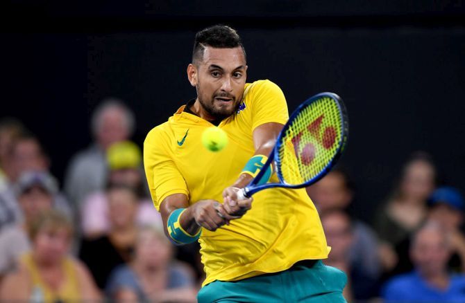 Australia's Nick Kyrgios plays a backhand return against Greece's Stefanos Tsitsipas during day five of the ATP Cup Group Stage at Pat Rafter Arena in Brisbane on Tuesday