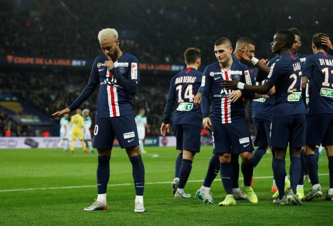 Paris St Germain's Neymar celebrates scoring their second goal against Saint-Etienne during their Coupe de la Ligue Ligue Cup match in Parc des Princes in Paris on Wednesday