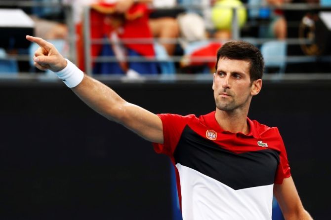 Serbia's Novak Djokovic celebrates winning his ATP Cup quarter-final singles match against Canada's Denis Shapovalov at the Ken Rosewall Arena, Sydney on Friday 