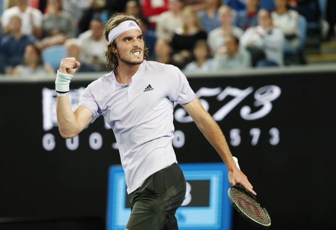 Greece's Stefanos Tsitsipas celebrates after defeating Italy's Salvatore Caruso