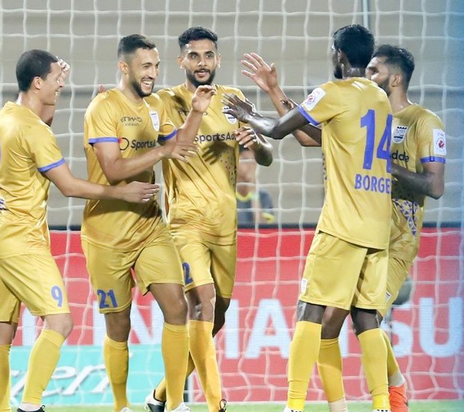 Mumbai FC players congratulate Mohamed Larbi as they celebrate his goal during the ISL match against Hyderabad on Friday