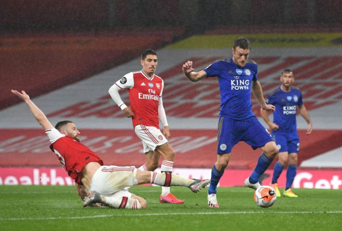 Leicester City's Jamie Vardy scores the equaliser against Arsenal during their English Premier League match at Emirates Stadium in London 