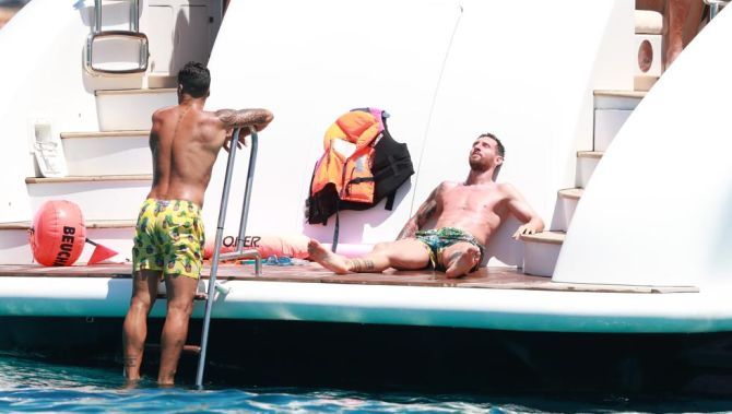 Lionel Messi and Luis Suarez on the yacht