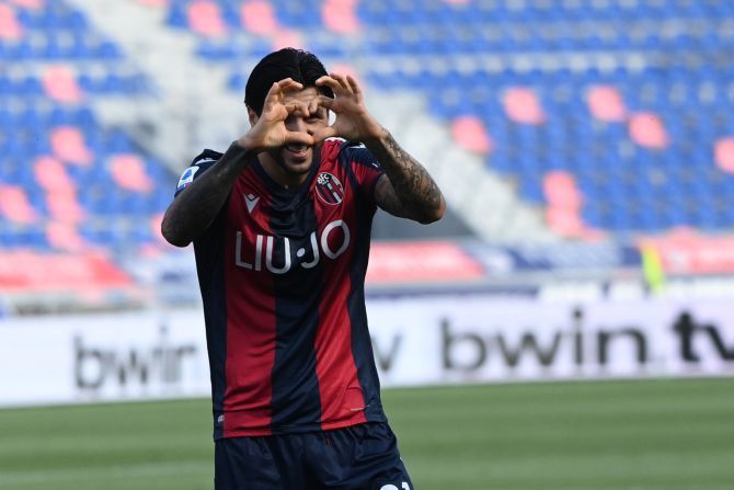 Bologna's Rodrigo Palacio celebrates on scoring the opening goal against Lecce