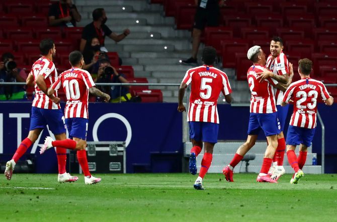 Atletico Madrid's Vitolo celebrates with teammates after netting their first goal against Real Valladolid at Wanda Metropolitano in Madrid on Saturday 